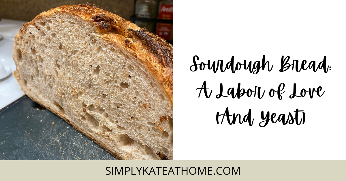 slice of sourdough on a navy blue cutting board